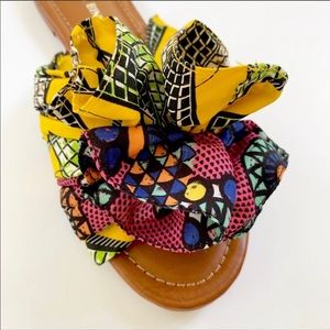 gianni bini dakeena flower pom slide sandals
